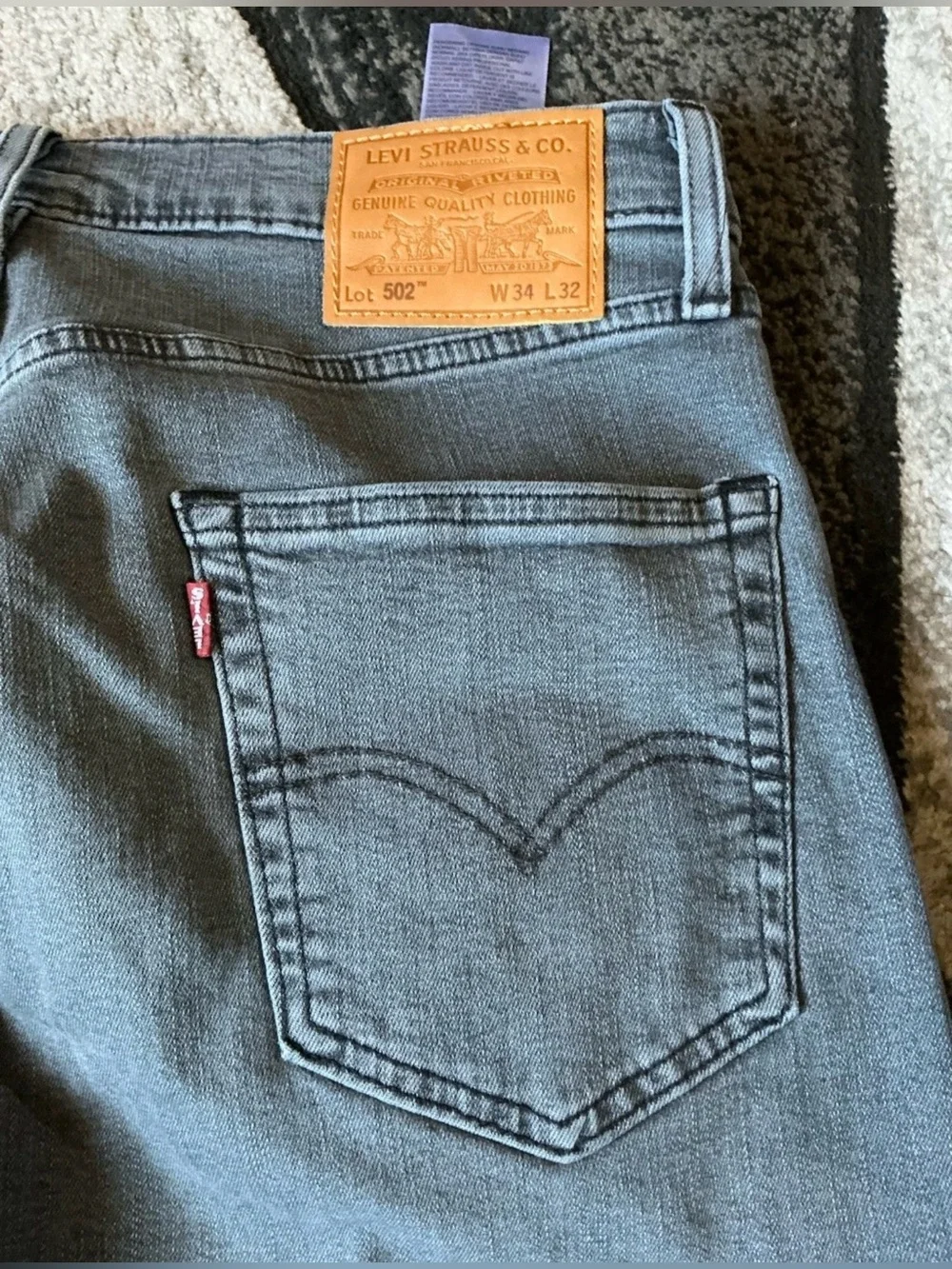 Size 34 x 32 - Levi & Strauss Levis 502 Taper Gray Wash Irregular Denim Jeans